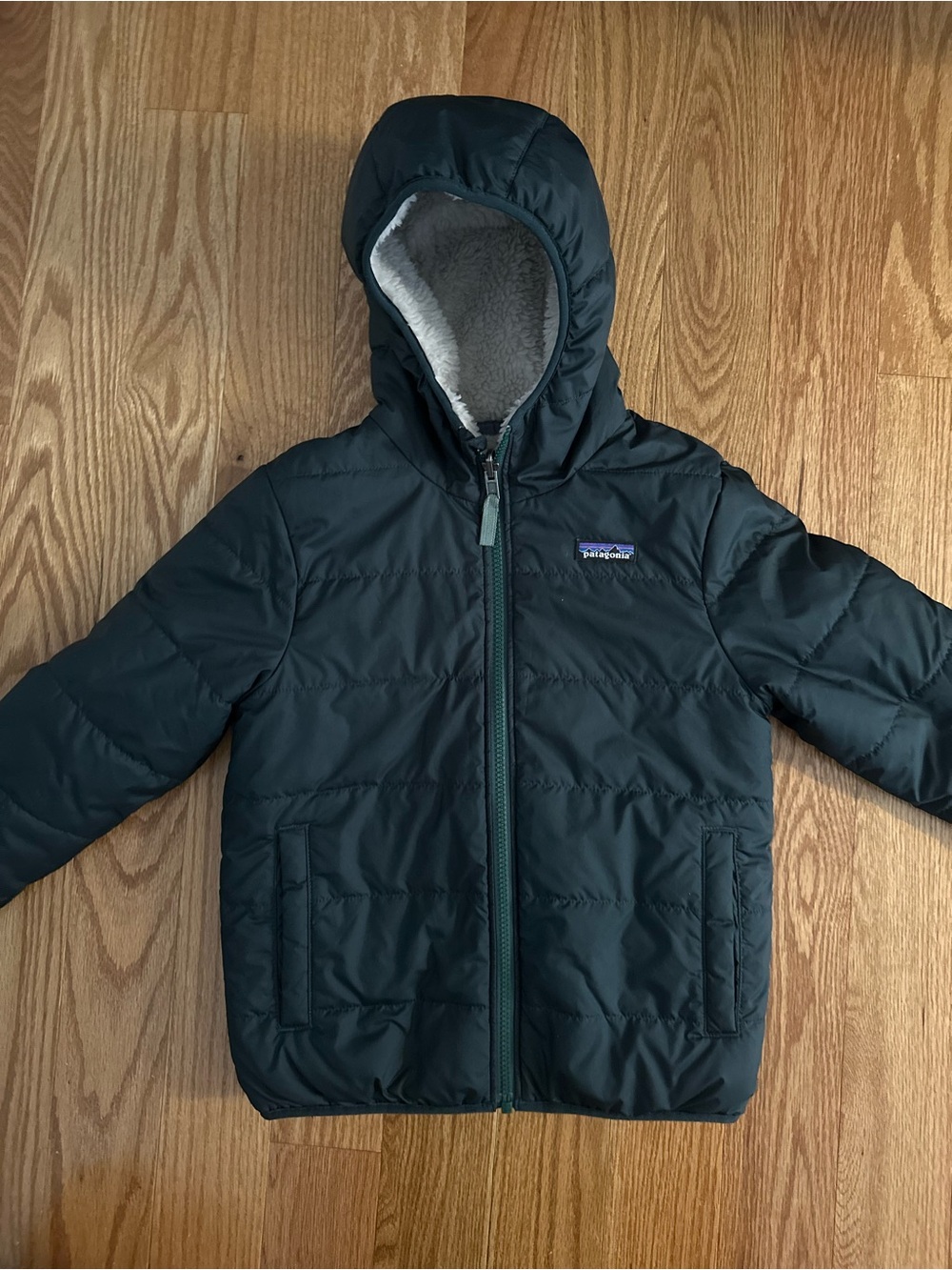 Patagonia Kids Ready Teddy Hooded Reversible Puffer Jacket in Deep Green, XS